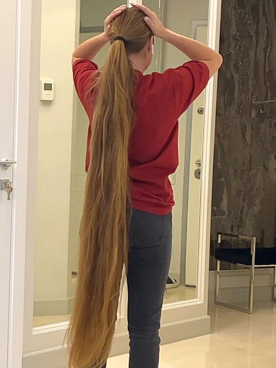 VIDEO Showing her very thick calf length hair RealRapunzels